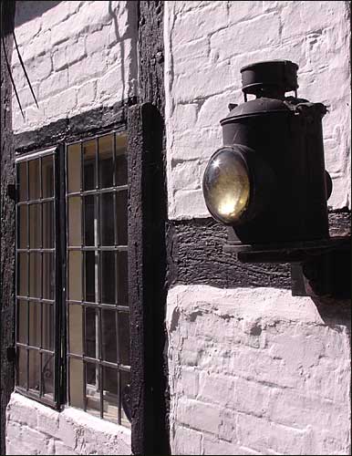 Lamp and a window, Elmley Castle, Worcestershire; March 18th, 2005